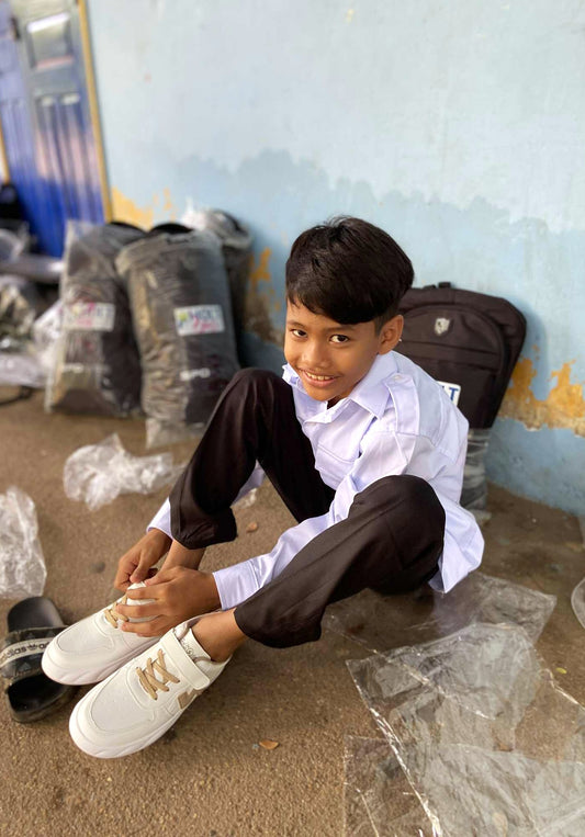 I’d like to add a pair of shoes for one child or additional donation to my order.