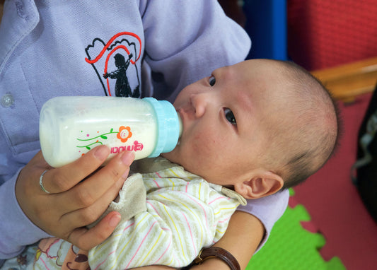 Feed a Baby in an Orphanage
