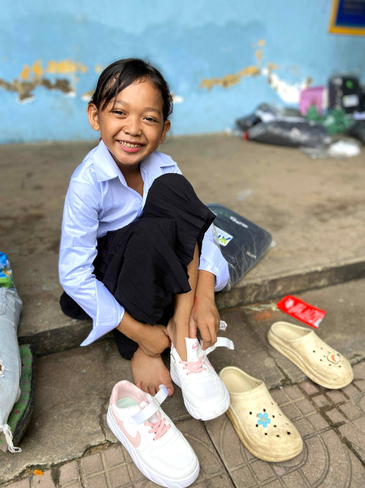 I’d like to add a pair of shoes for one child or additional donation to my order.